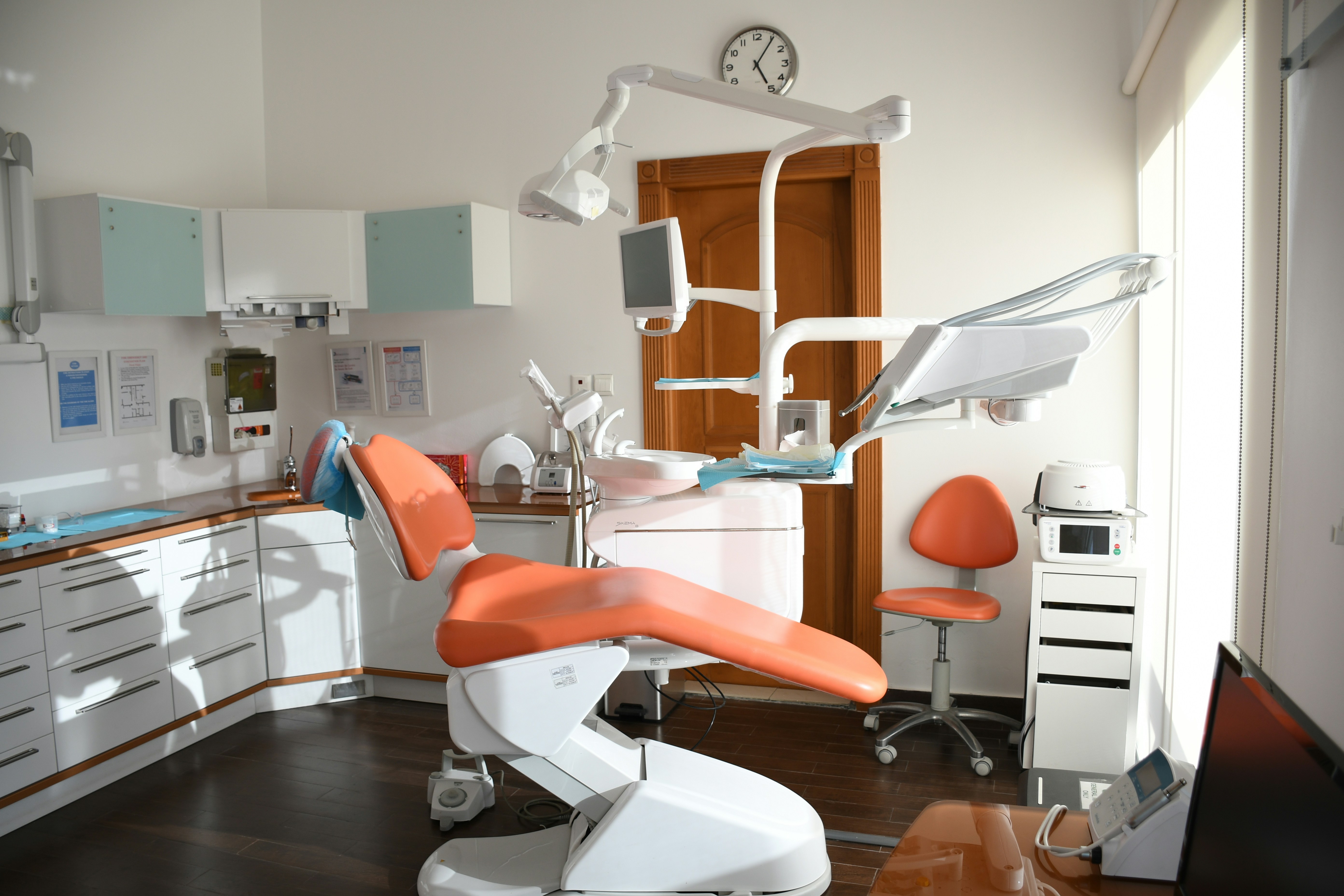 Dentist preparing dental tools for a patient